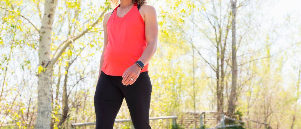 Woman wearing Apple Watch on a hike